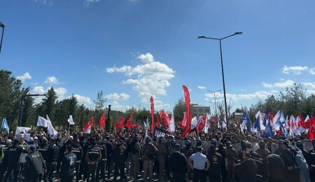 Protesters Throw Stones, Chant “Resign” at Parliament